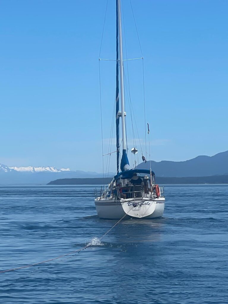 Sailboat on calm blue waters