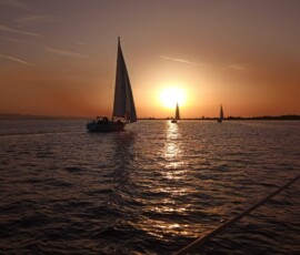 sailing - sunset and sunny skies ahead